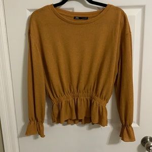 Burnt orange shirt with cinched waist